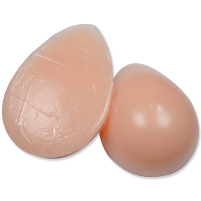 Silikonbrüste in Tropfenform, mit Haftschicht, farblose Nippel, Typ T1